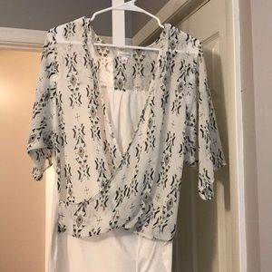 Cute split front blouse Charming Charlie